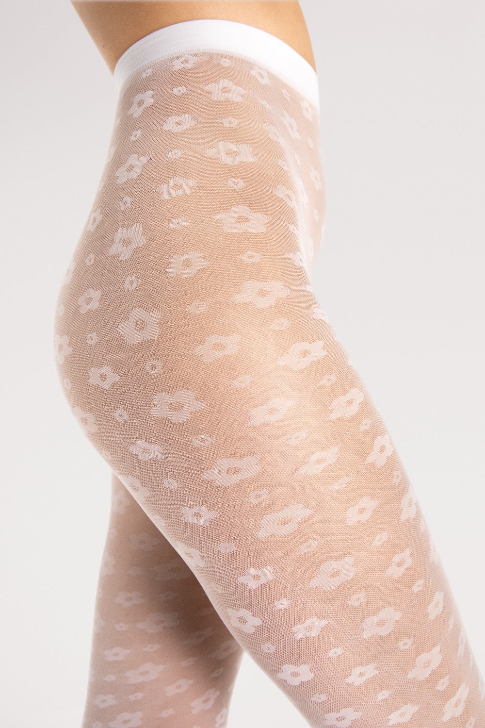 The small, enchanting flowers on the tights