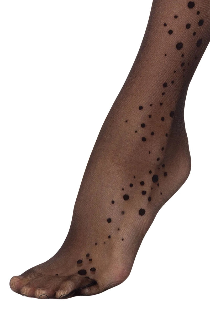 Feet in dotted pantyhose
